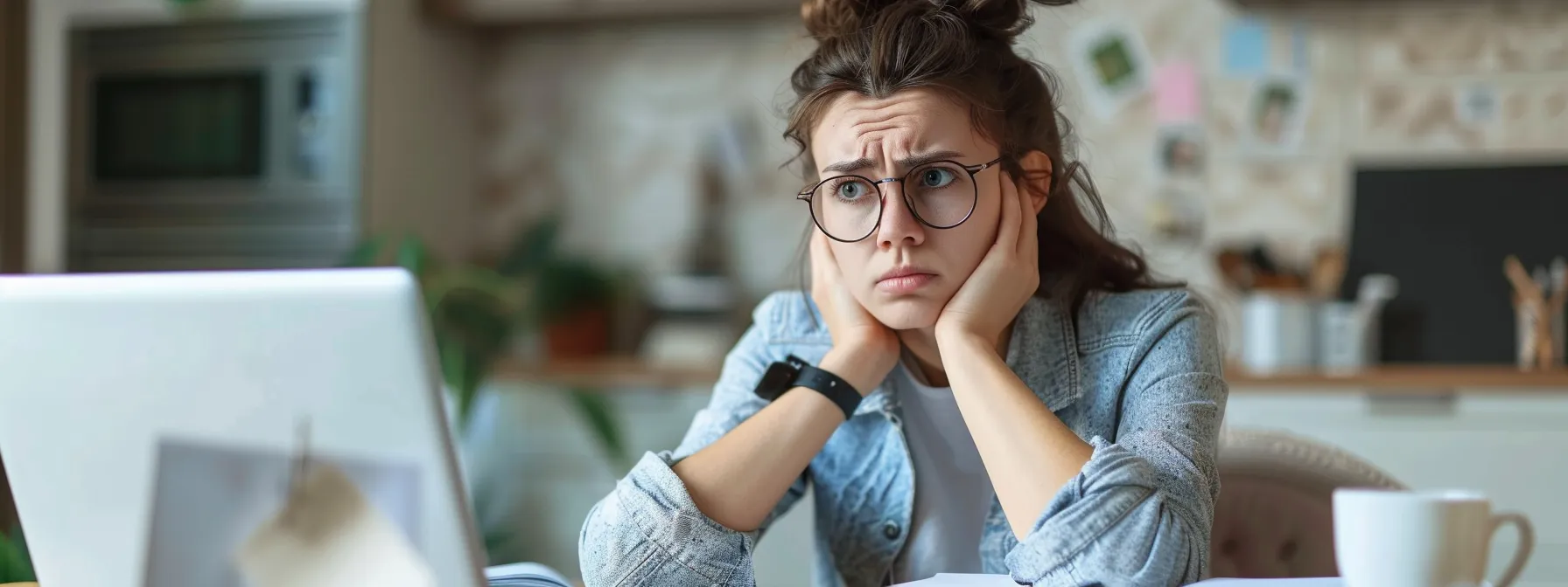 a determined buyer with a confident expression, reviewing multiple property listings on a laptop while taking notes on a notepad.