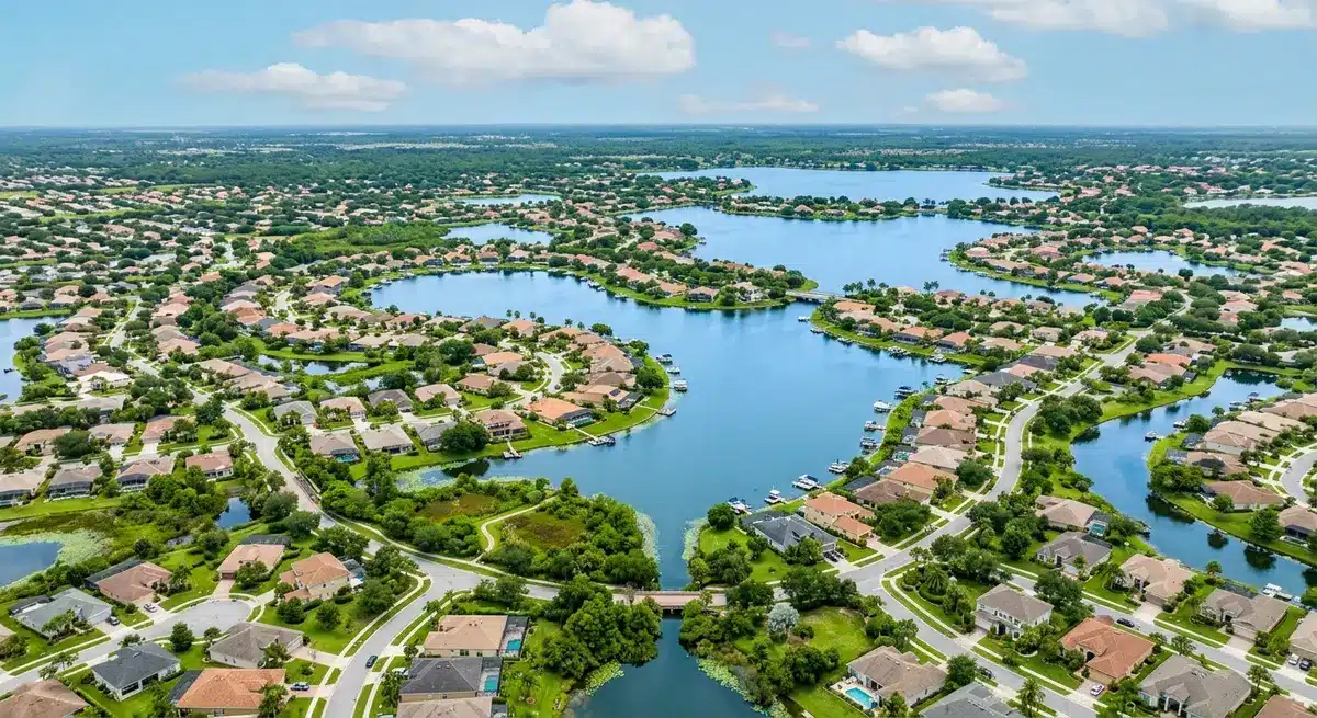 Aerial view of a Florida community with interconnected lakes and no overhead power lines